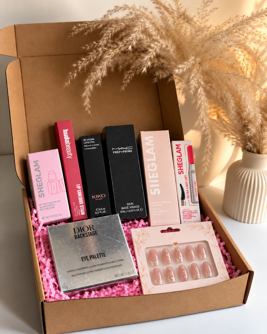 All in one Bundle. Sheglam Foundation + M.A.C Primer + Sheglam Mascara + Huda Lip Contour + Dior Eyeshadow/Highlighter Pallet + Sheglam/Rare Beauty Blush + Any Lipgloss.